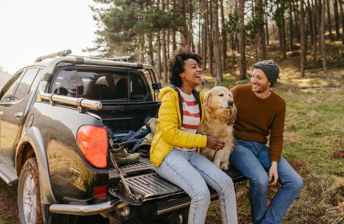 Couple on trip with dog
