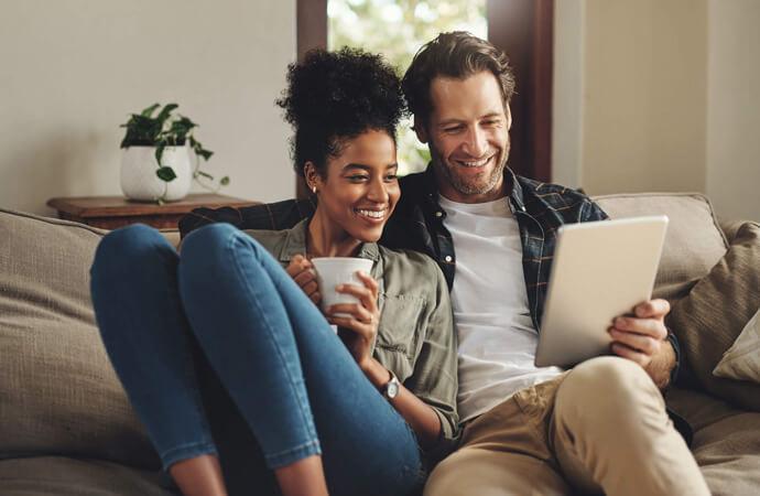 Bi-Racial Couple with Tablet