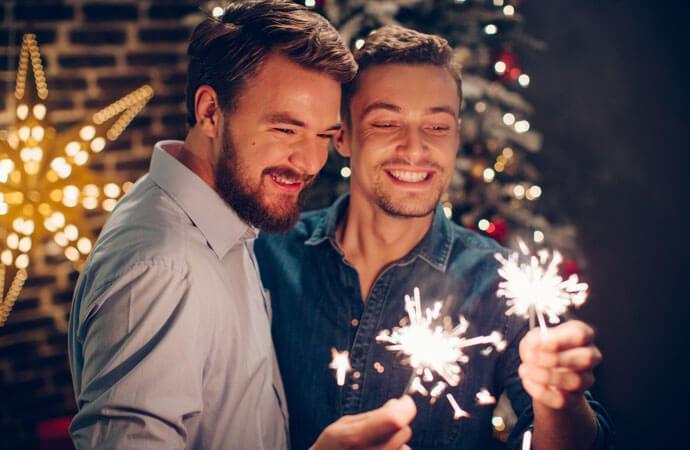 Men celebrating with sparklers