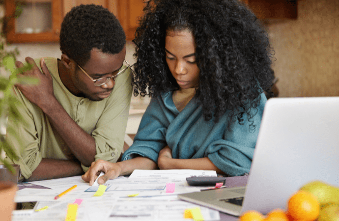man and woman reviewing documents