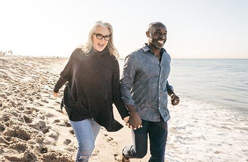 Couple walking on beach