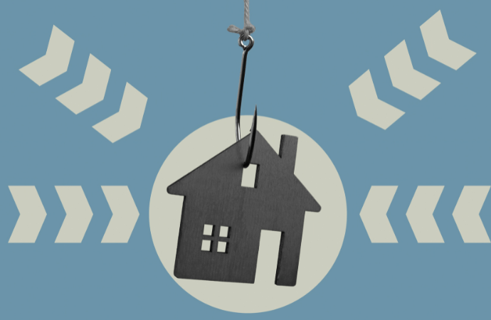 A wooden house hanging on a fishhook