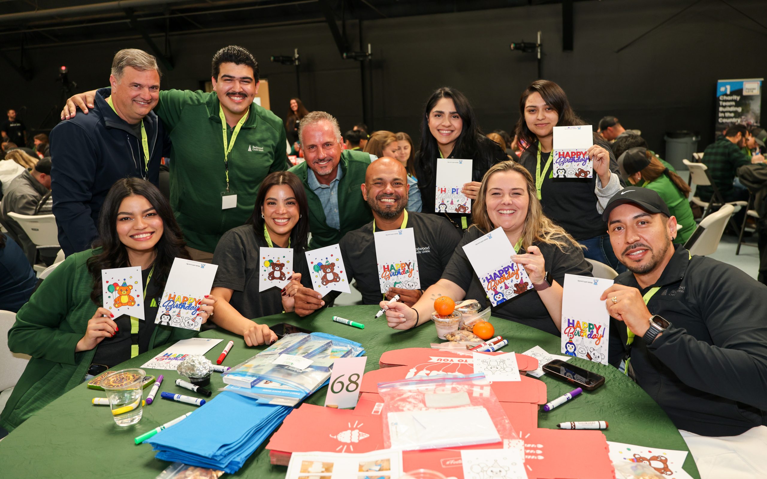 Team Members with decorated birthday cards