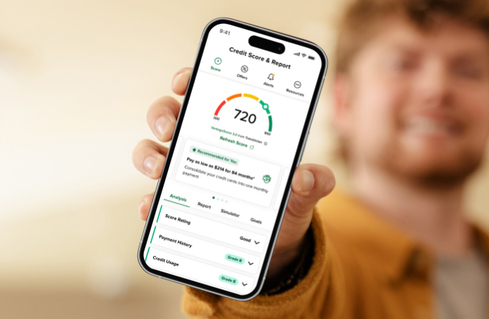 Man holding phone showing credit score